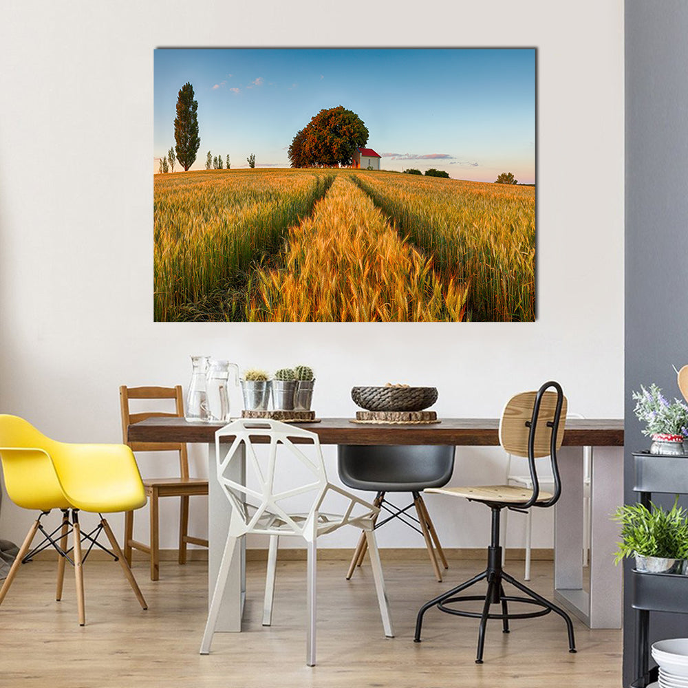 Summer Wheat Field at Golden Hour Canvas Wall Art in gold, yellow and blue, single panel hung on a wall