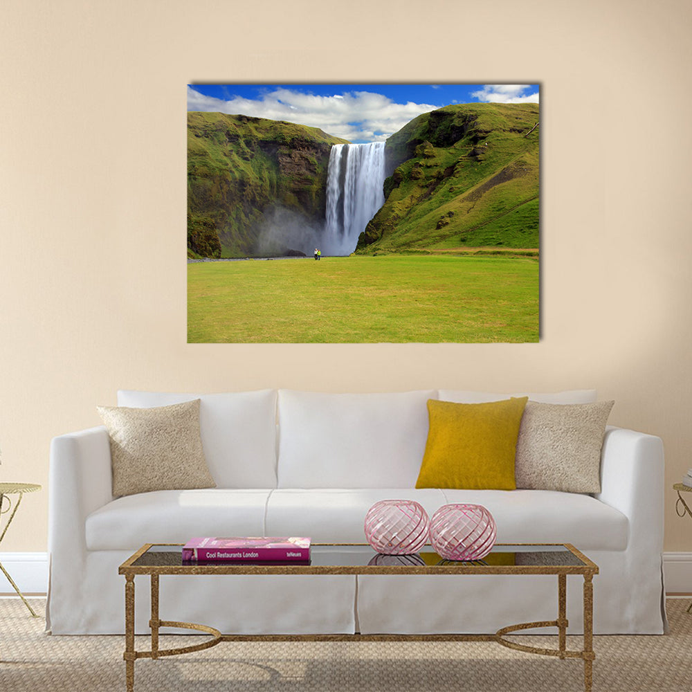 Skogarfoss Waterfall In South East Iceland Canvas Wall Art in white, green and blue, single panel hung on a wall
