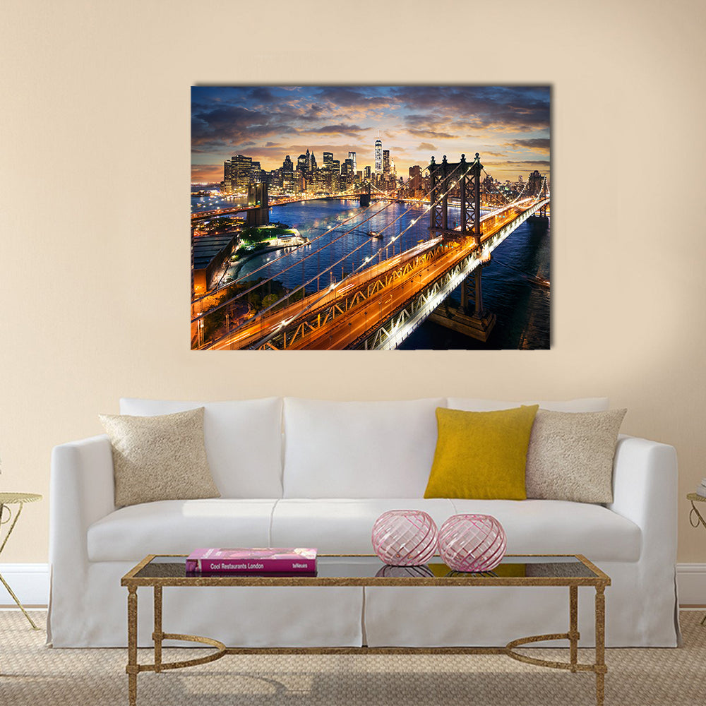 Manhattan Bridge and Skyline at Dusk Canvas Wall Art in orange, yellow and blue, single panel hung on a wall