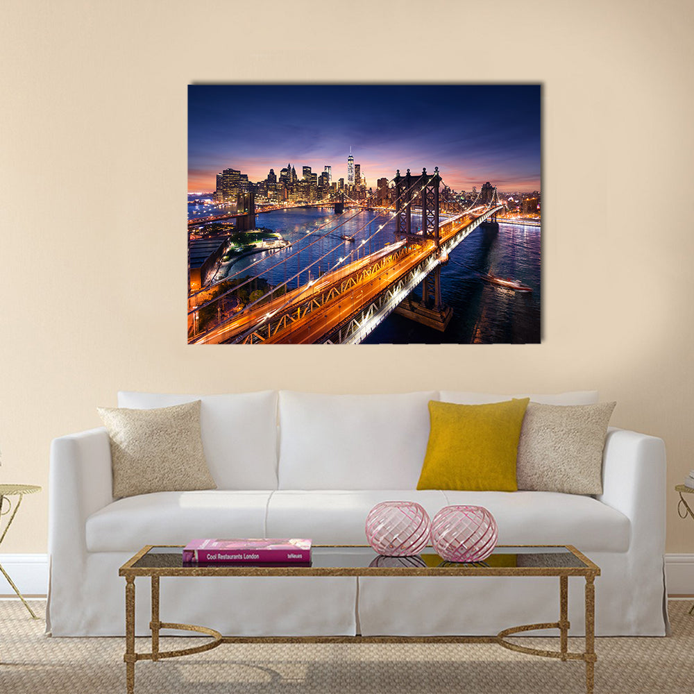 Dusk Over Manhattan Bridge Canvas Wall Art in orange, blue and purple, single panel hung on a wall
