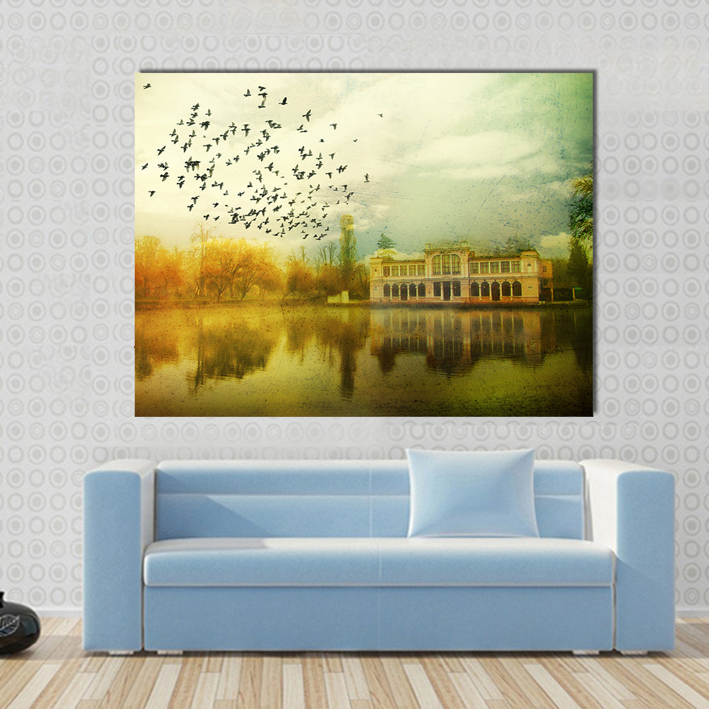 Flock Over Vintage Lakeside Mansion Canvas Wall Art in brown, yellow and green, single panel hung on a wall