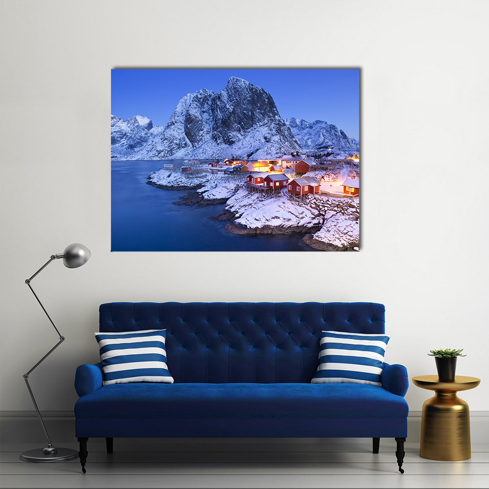 Lofoten Fisherman's Cabins Canvas Wall Art in white, orange and blue, single panel hung on a wall