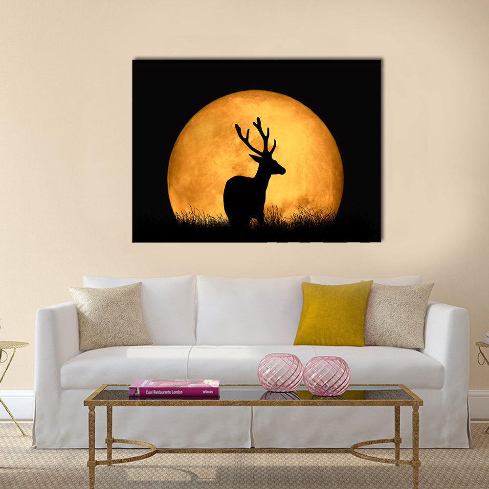 Deer Silhouette With Large Moon Canvas Wall Art in black, orange and yellow, single panel hung on a wall