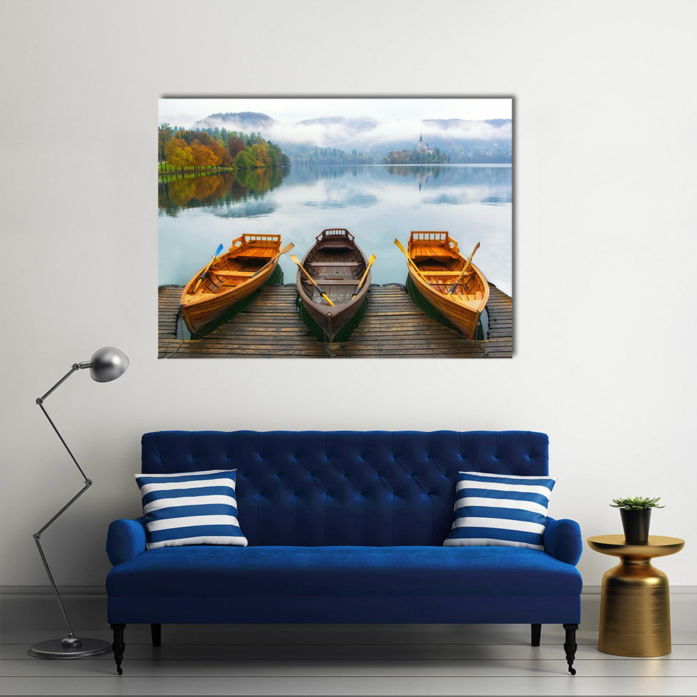 Boats on Bled Lake Canvas Wall Art in gray, brown and blue, single panel hung on a wall