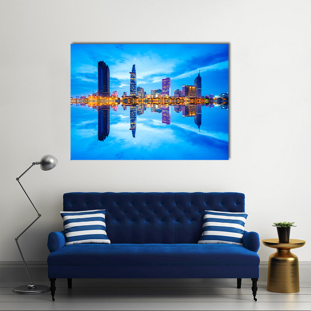 Ho Chi Minh City Canvas Wall Art in orange, yellow and blue, single panel hung on a wall