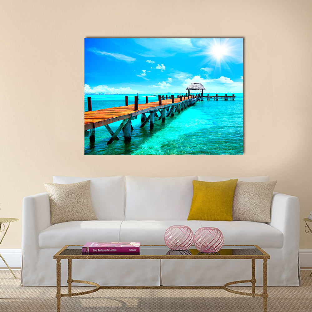 Sunlit Wooden Pier and Thatched Hut Canvas Wall Art