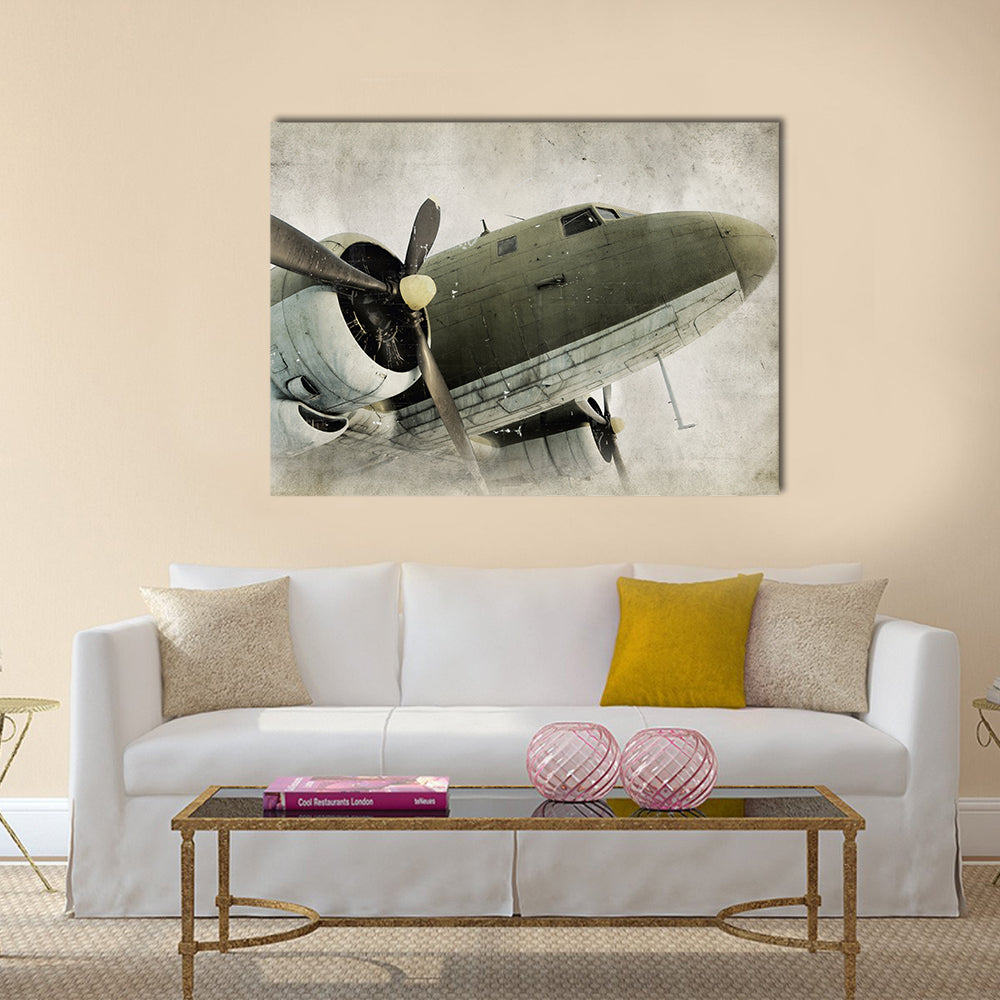 Vintage Propeller Airplane Close-up Canvas Wall Art in gray, beige and green, single panel hung on a wall