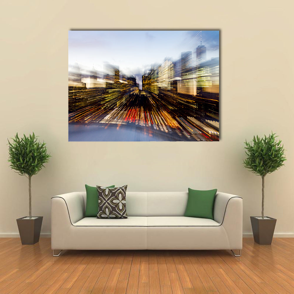 New York City Downtown Building Lights At Dusk In Manhattan Canvas Wall Art in black, yellow and blue, single panel hung on a wall