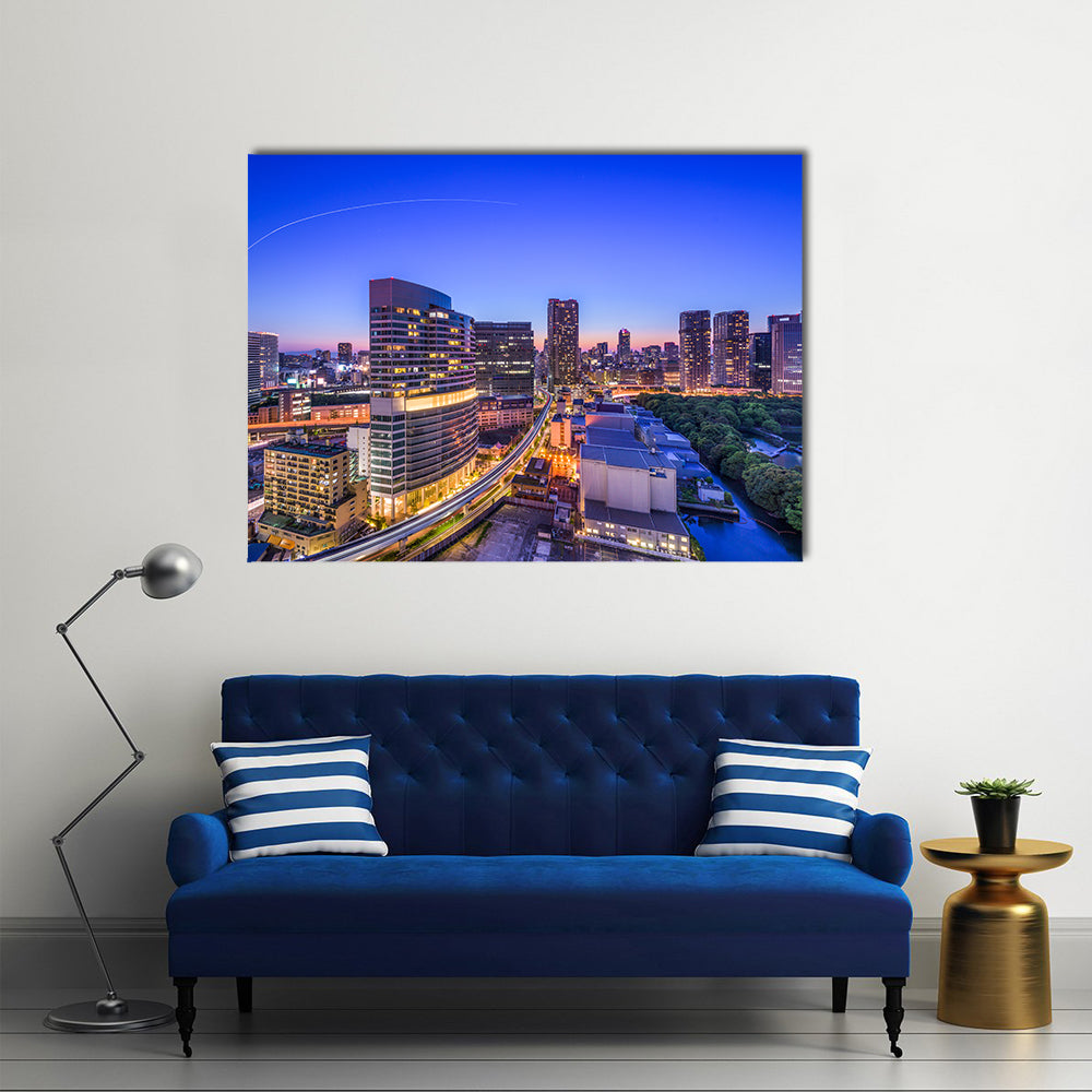 Tokyo Cityscape In Japan Canvas Wall Art in black, yellow and blue, single panel hung on a wall