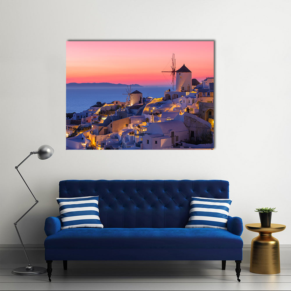 Sunset in Santorini Canvas Wall Art in orange, blue and pink, single panel hung on a wall