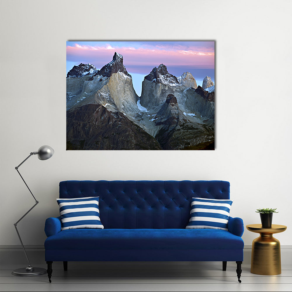 Torres Del Paine Mountain Peaks at Sunrise Canvas Wall Art in gray, blue and pink, single panel hung on a wall
