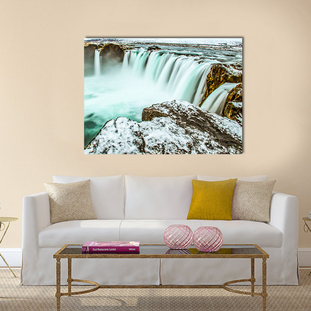 Godafoss Waterfall In Iceland Canvas Wall Art in white, gray and blue, single panel hung on a wall