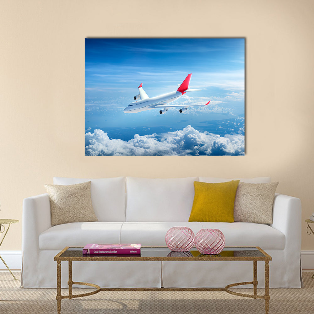 Airplane Flying Above Clouds Canvas Wall Art