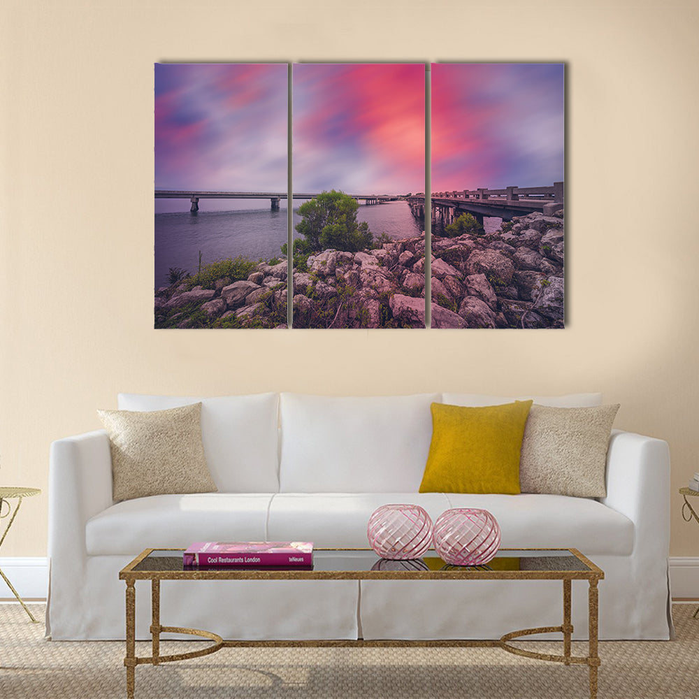 Bridges Between Amelia and Big Talbot Islands Canvas Wall Art in gray, purple and pink, 3 panel horizontal set hung on a wall