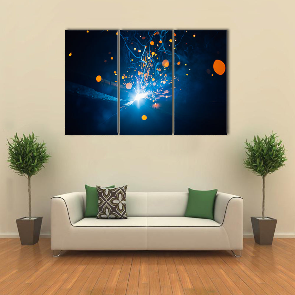 Welding Arc with Blue Smoke and Sparks Canvas Wall Art