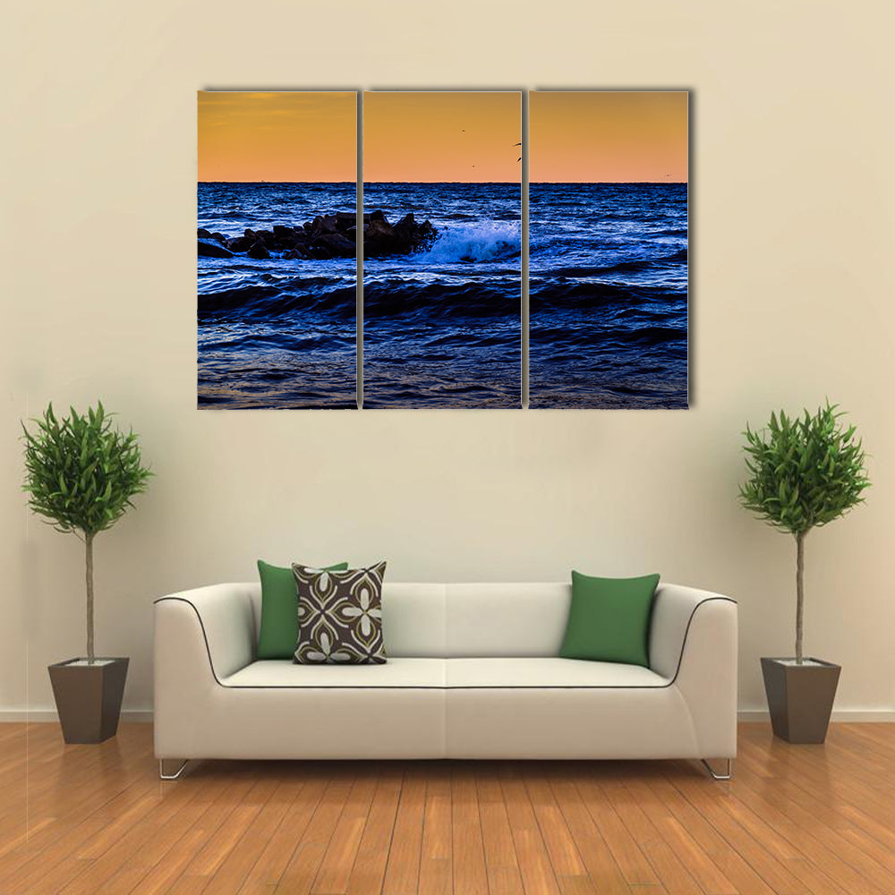 Blue Ocean Waves at Sunset Canvas Wall Art