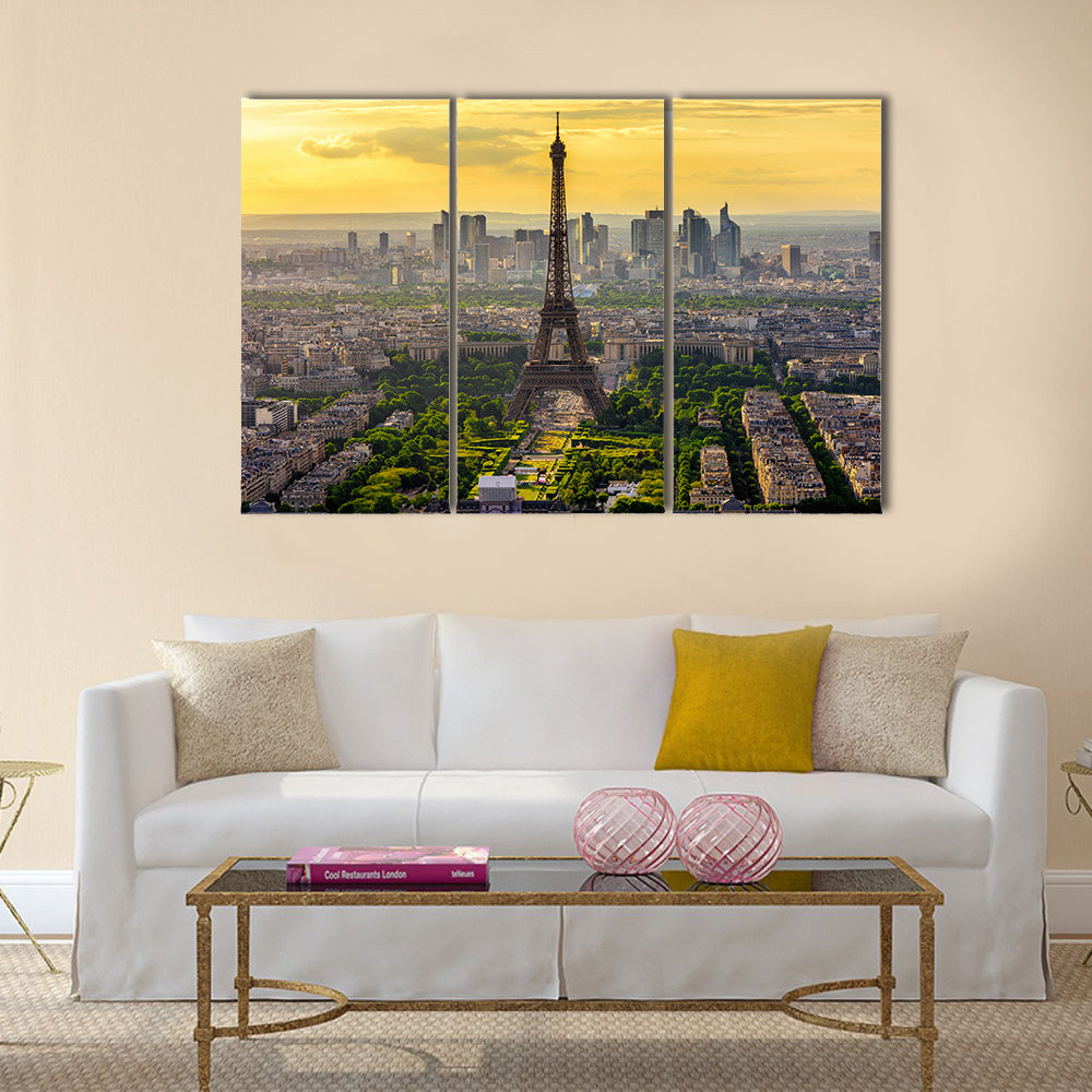 Eiffel Tower at Sunset, Paris Skyline Canvas Wall Art in gray, yellow and green, 3 panel horizontal set hung on a wall