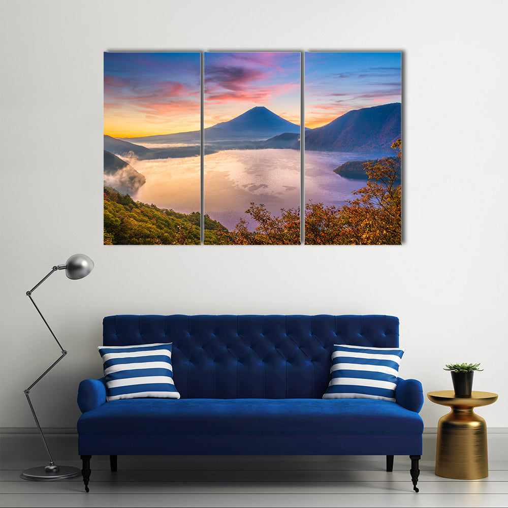 Mount Fuji and Motosu Lake Canvas Wall Art in orange, yellow and blue, 3 panel horizontal set hung on a wall
