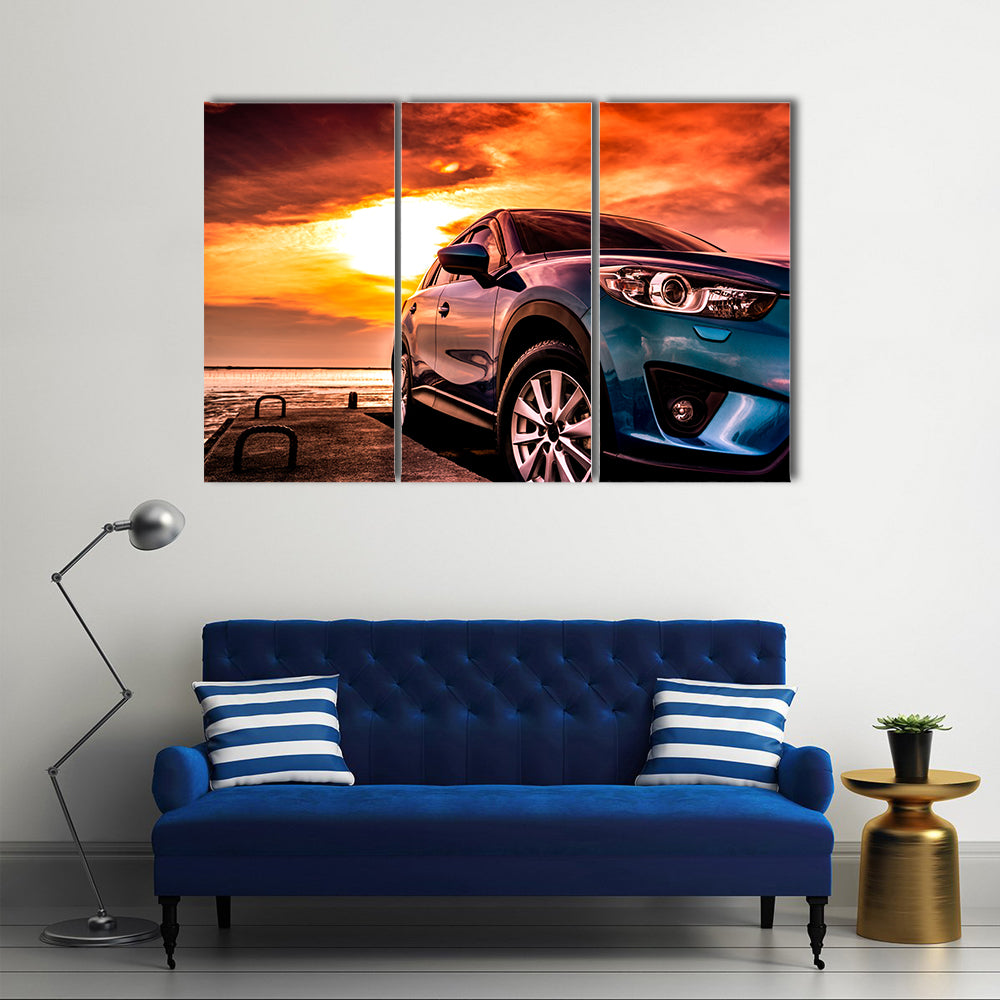 Blue Suv at Coastal Sunset Canvas Wall Art