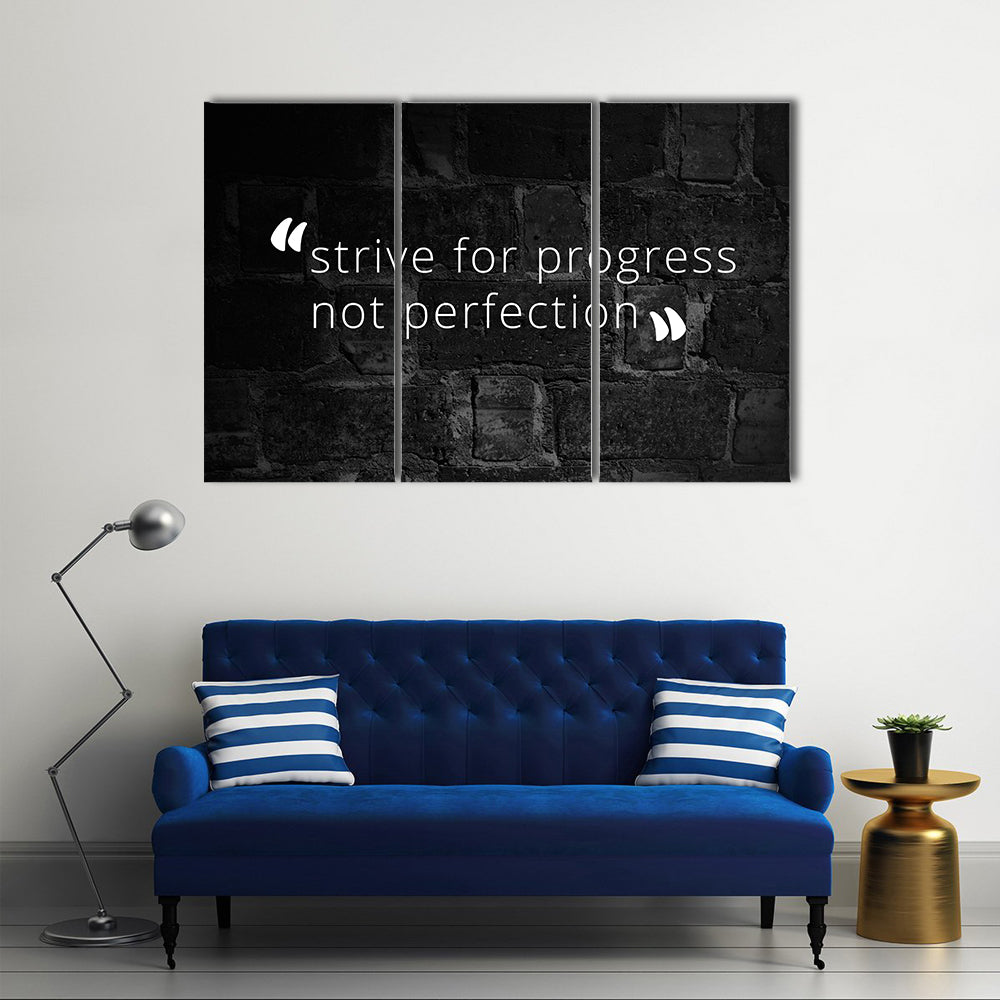 Strive for Progress Not Perfection Quote Canvas Wall Art in black and white, 3 panel horizontal set hung on a wall