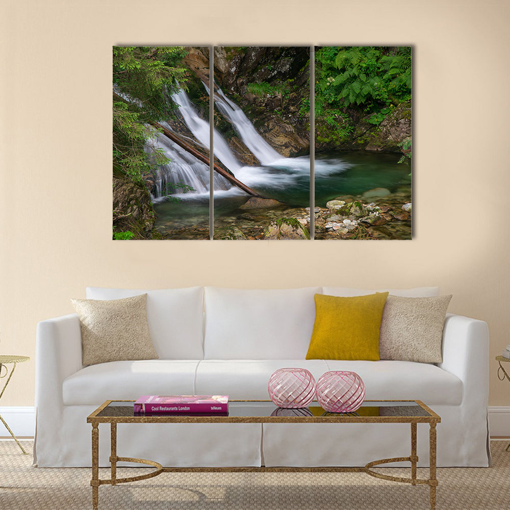 Mountain Mickiewicz Waterfall Canvas Wall Art in white, brown and green, 3 panel horizontal set hung on a wall
