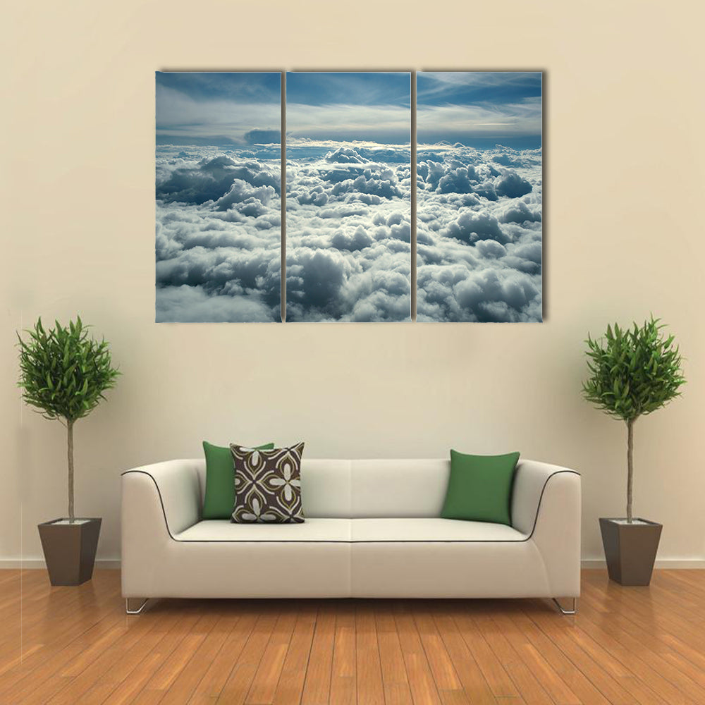 Clouds In Morning From Airplane Canvas Wall Art