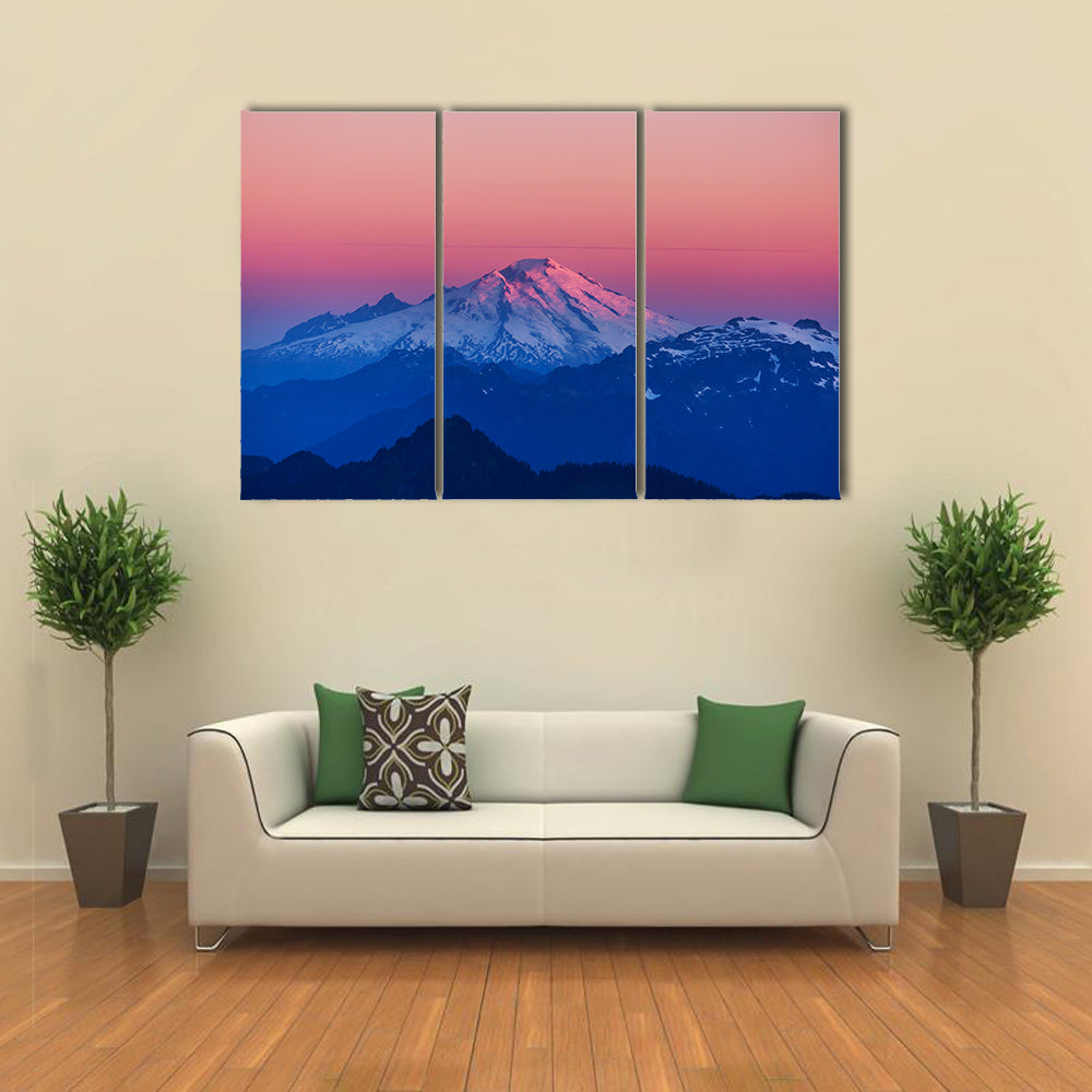 Mountain Peak In North Cascade Range Washington Canvas Wall Art in black, white and pink, 3 panel horizontal set hung on a wall