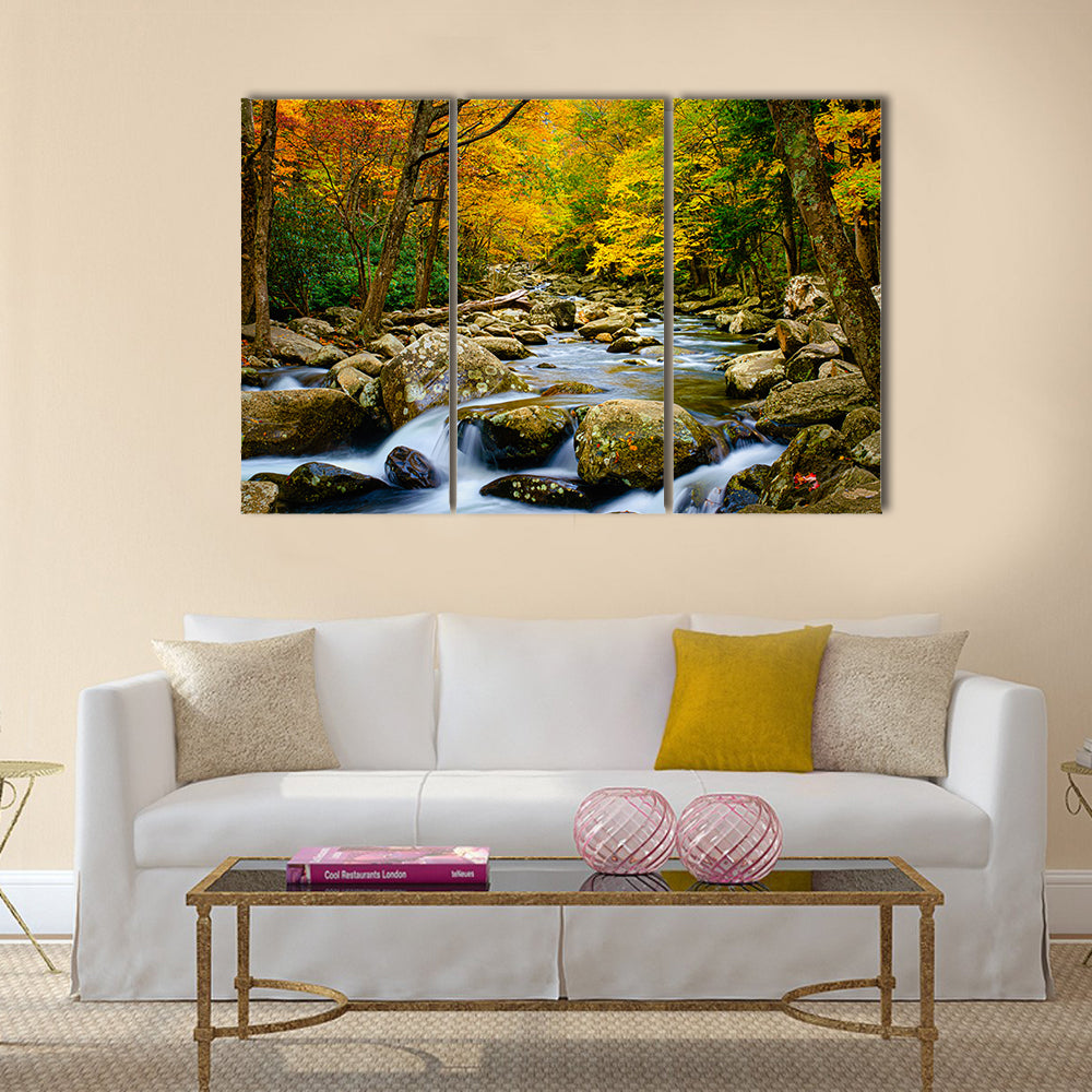 Rushing Stream in Great Smokey Mountains Canvas Wall Art in brown, yellow and green, 3 panel horizontal set hung on a wall