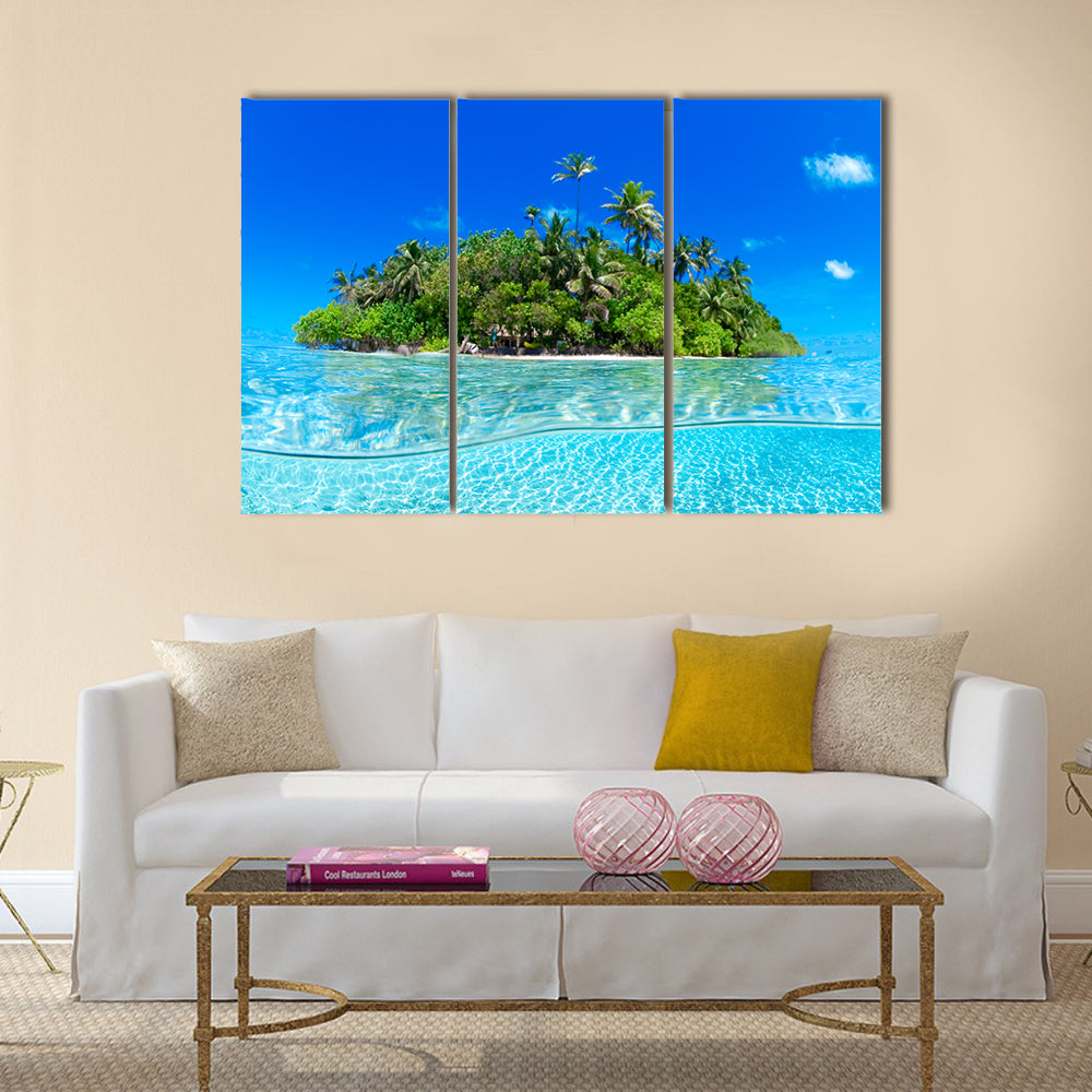 Split-level Tropical Island Canvas Wall Art in green and blue, 3 panel horizontal set hung on a wall