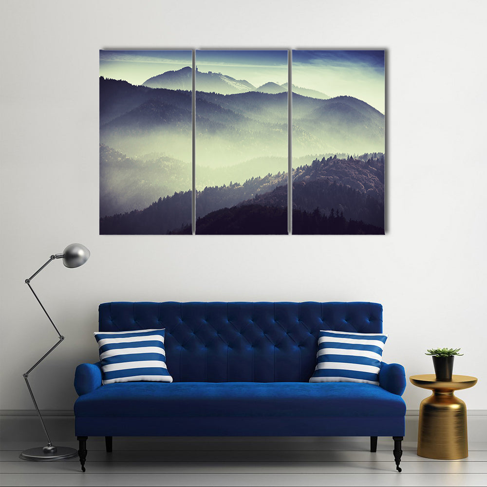 Misty Mountain Valley with Tower Silhouette Canvas Wall Art