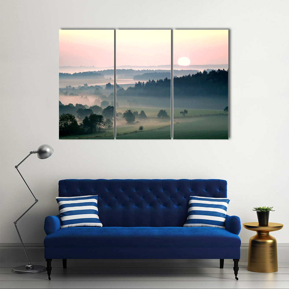 Misty Sunrise Over Layered Hills Canvas Wall Art