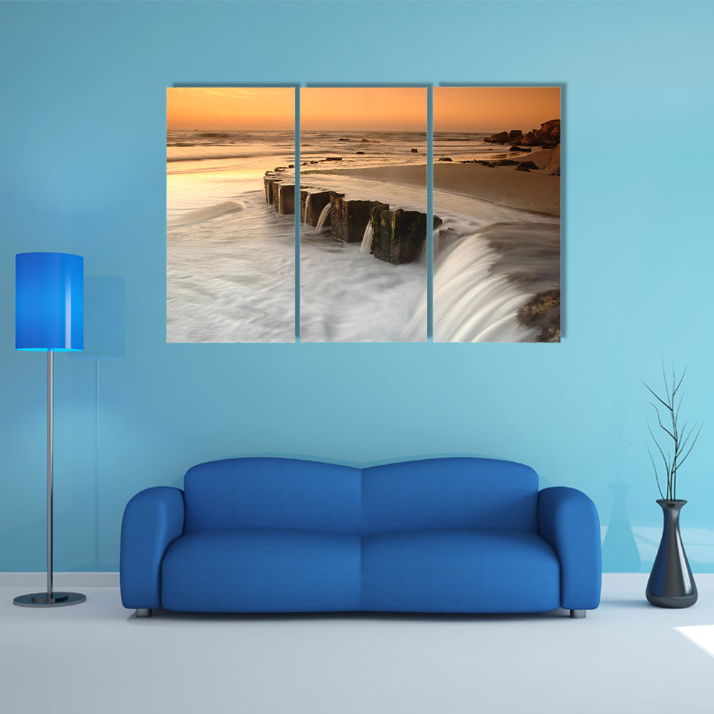 Waterfall By The Sea At Sunset Canvas Wall Art
