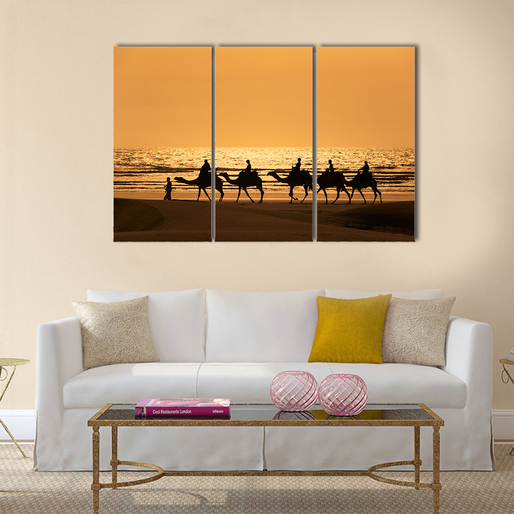 Silhouette Of Dromedary And Tourists At Sunset Morocco Canvas Wall Art