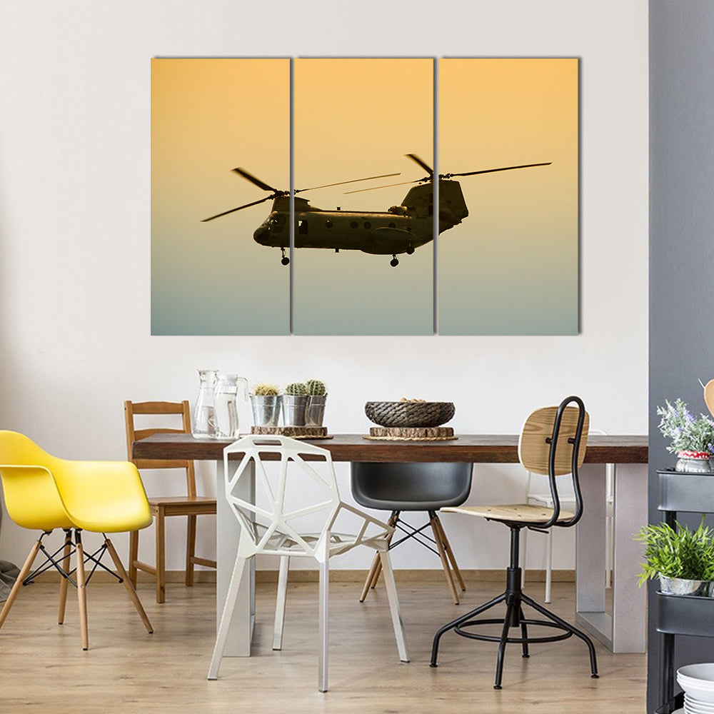 Military Cargo Helicopter In Flight At Dawn Canvas Wall Art