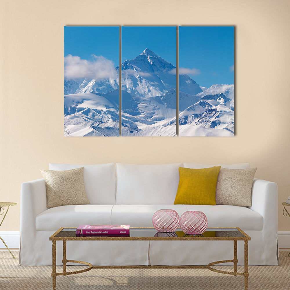 Mount Everest Snow Peaks Canvas Wall Art in white and blue, 3 panel horizontal set hung on a wall