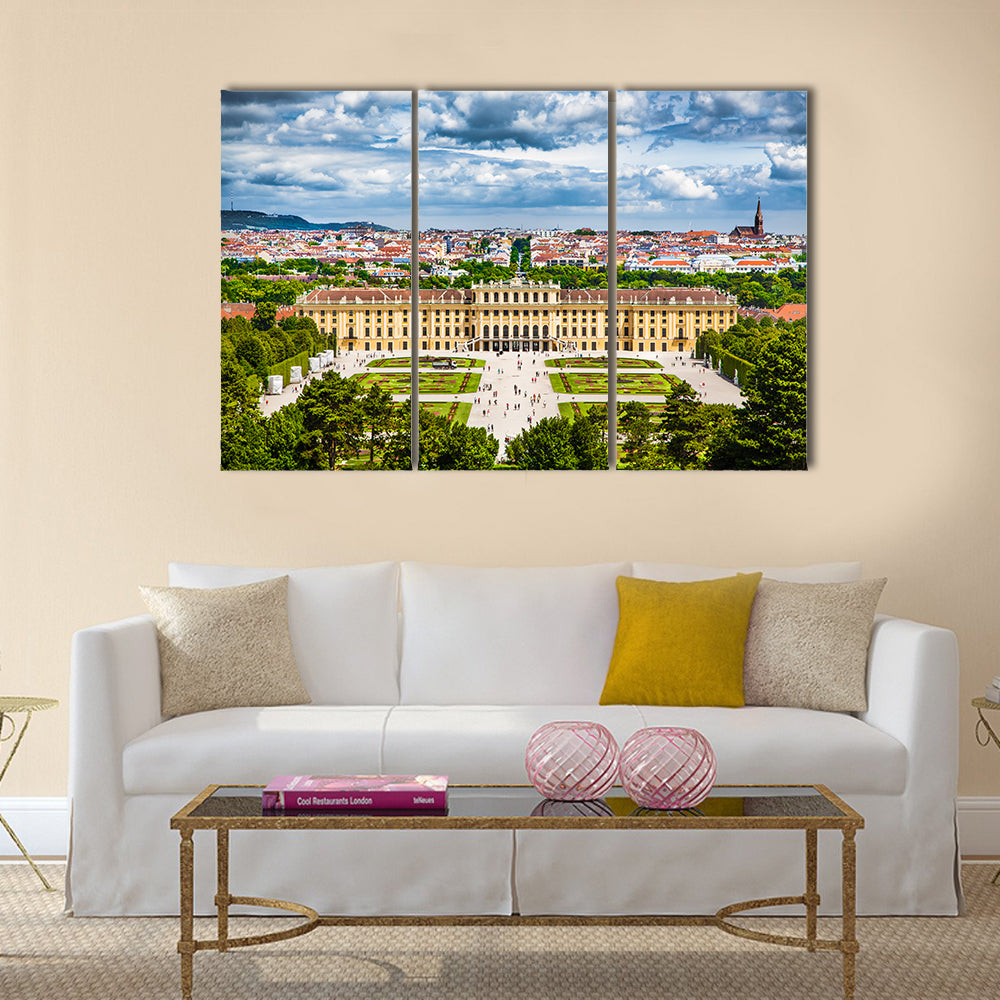 Schonbrunn Palace Parterre Garden, Vienna Canvas Wall Art in yellow, green and blue, 3 panel horizontal set hung on a wall