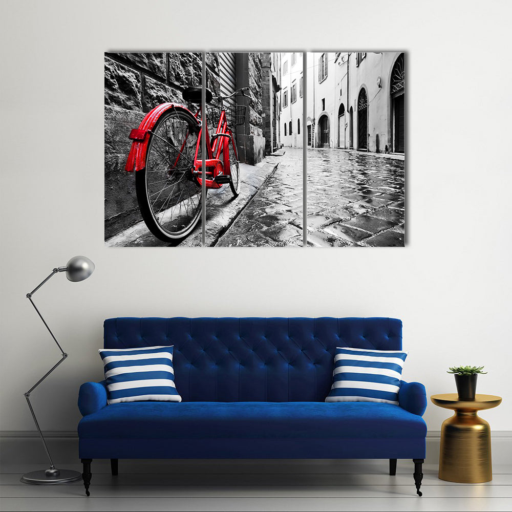 Red Bicycle on Cobblestone Street Canvas Wall Art