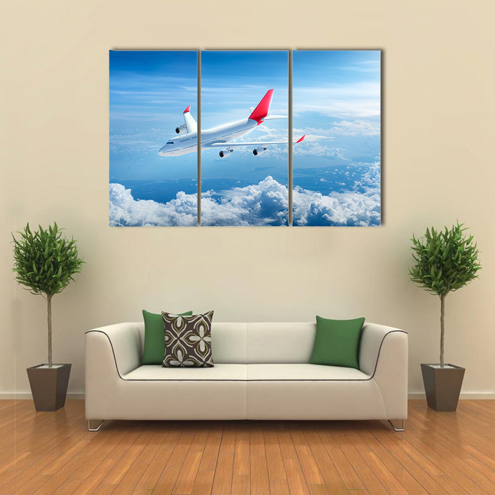 Airplane Flying Above Clouds Canvas Wall Art