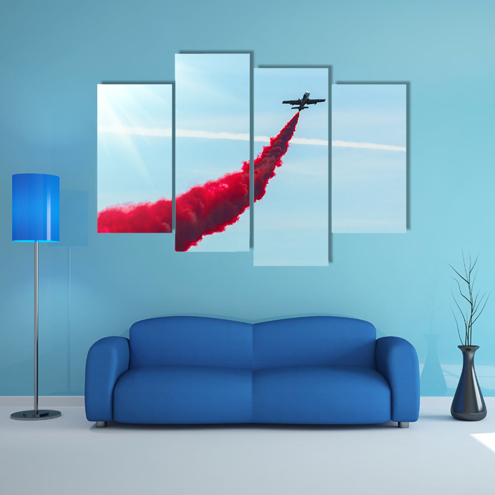 Airplane fly With Red Trail Smoke Canvas Wall Art