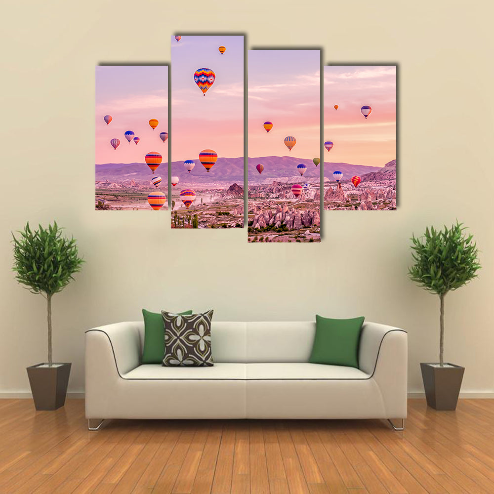 Hot Air balloons Flying Over Rock Landscape At Cappadocia Canvas Wall Art