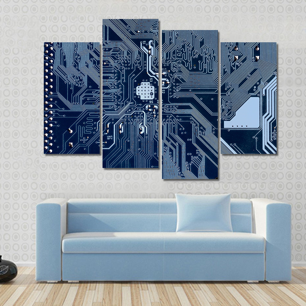 Blue Circuit Board Canvas Wall Art in blue and navy, 4 panel Pop layout hung on a wall