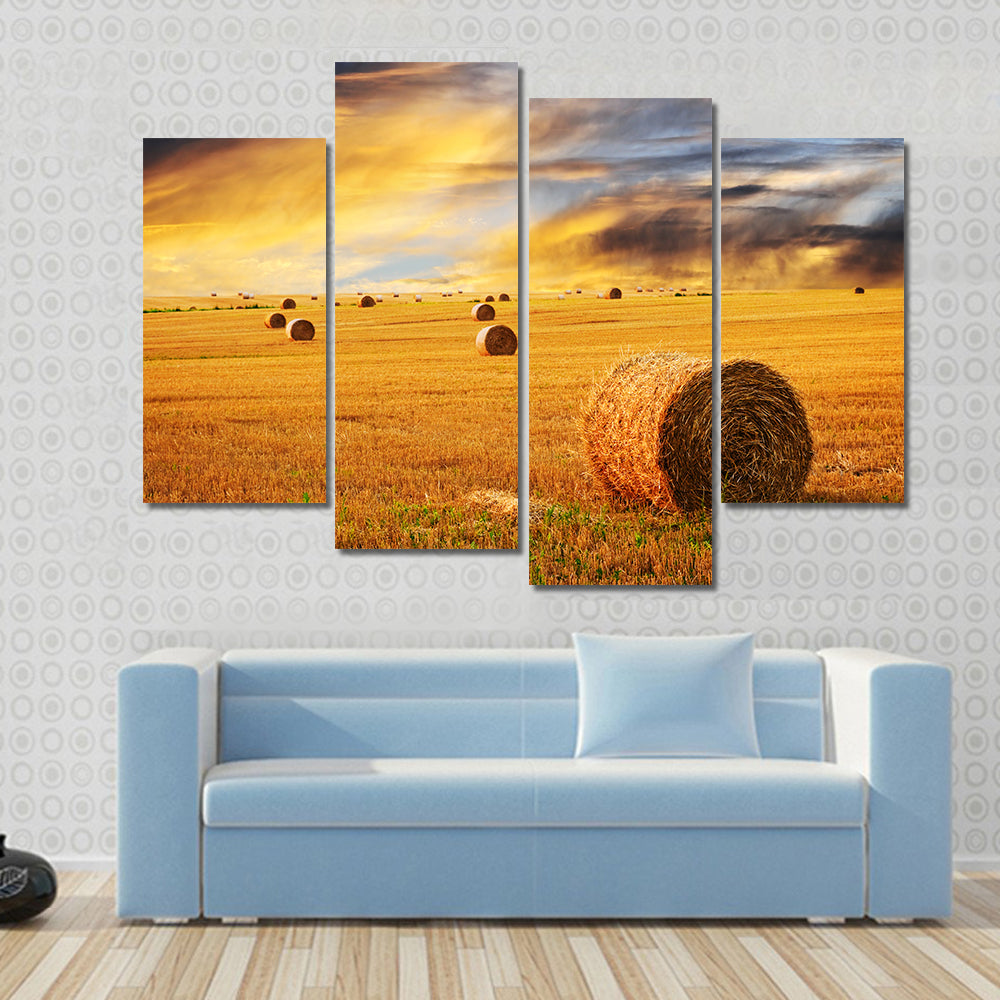 Golden Sunset Over Farm Field With Hay Bales Canvas Wall Art