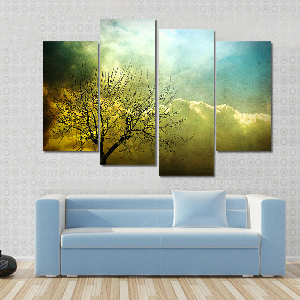 Grunge Leafless Tree with Backlit Clouds Canvas Wall Art