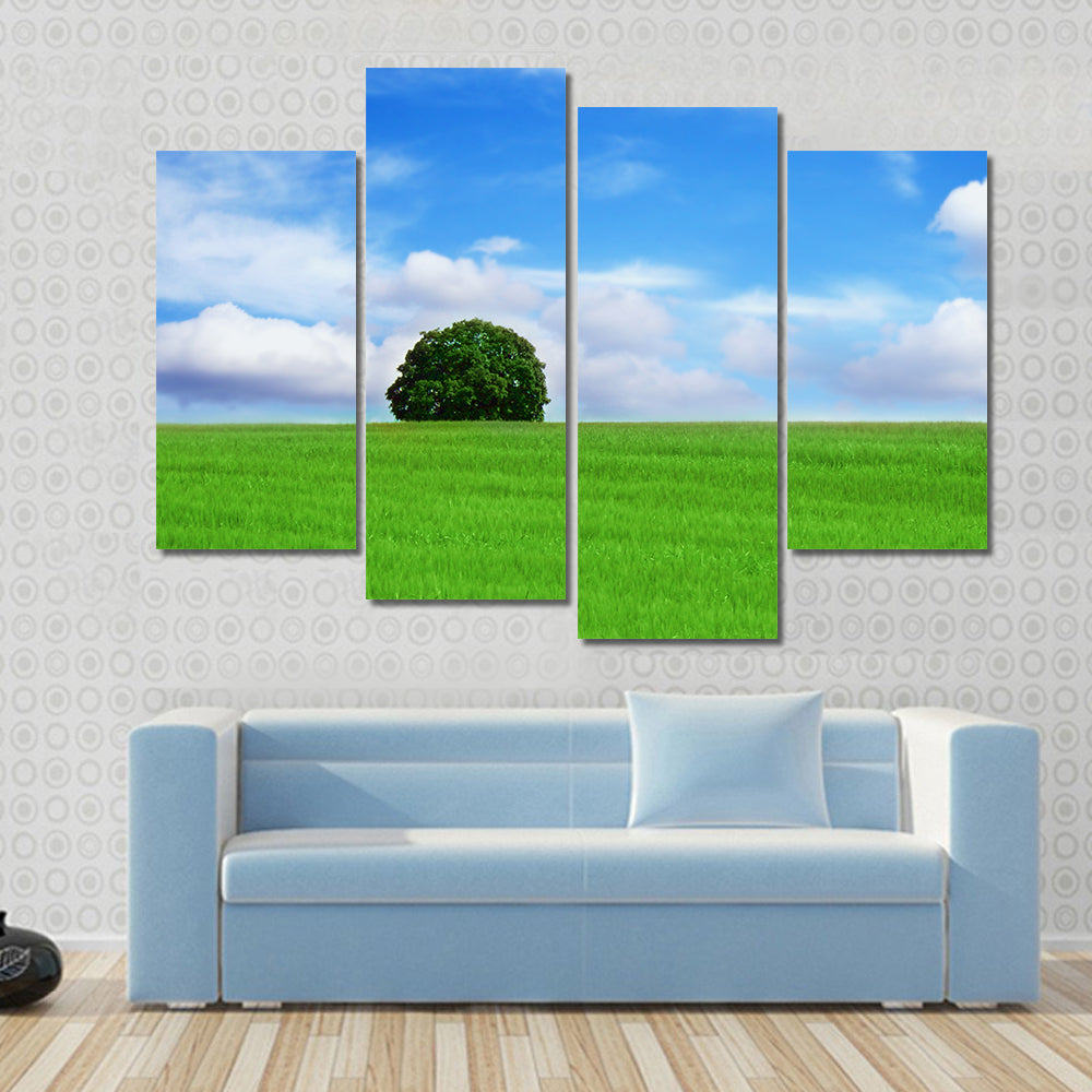 Lone Tree in Vibrant Green Field Canvas Wall Art