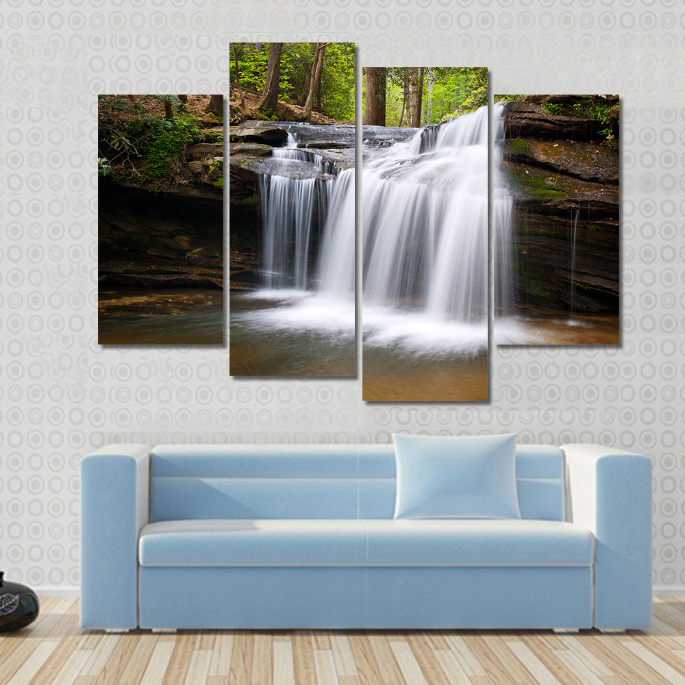 Cascading Forest Waterfall Over Layered Rocks Canvas Wall Art