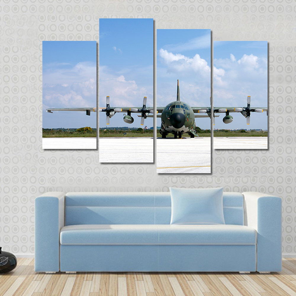 Military Airplane Parked At An Airbase Canvas Wall Art