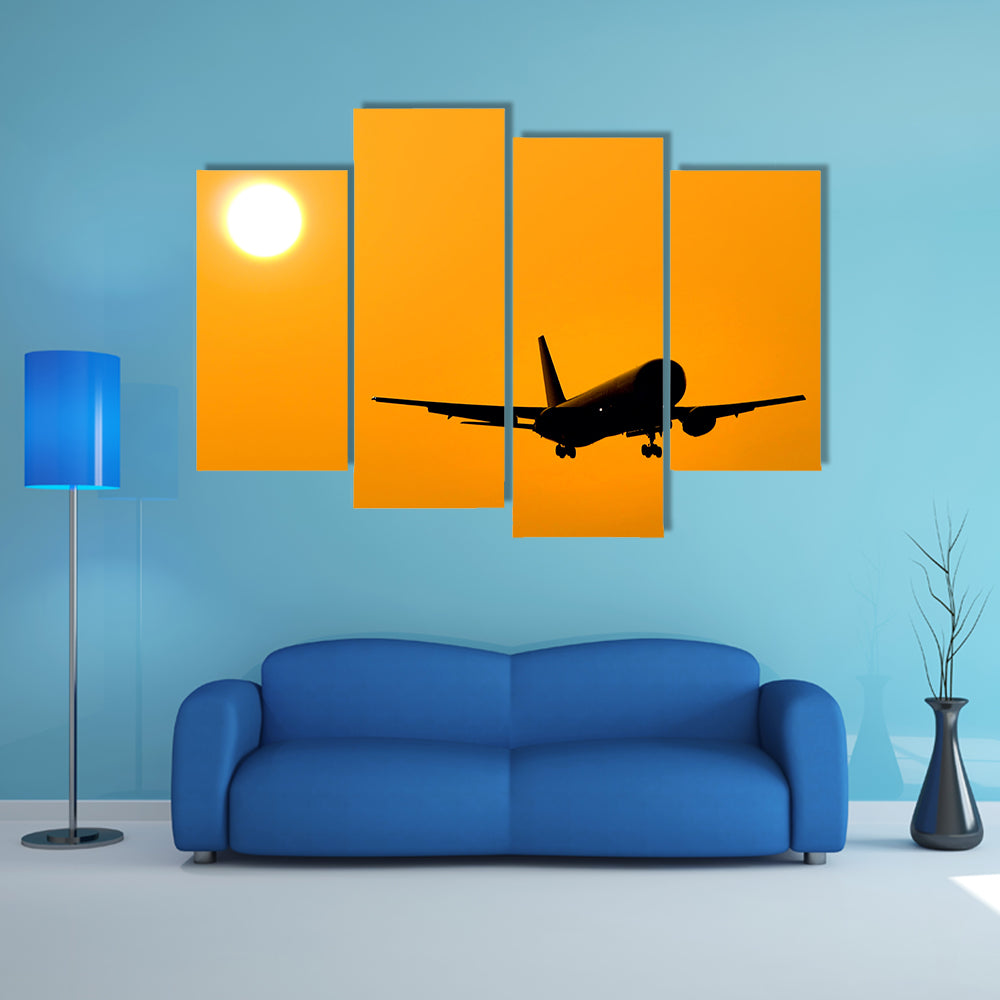 Aircraft Landing At Sunset Canvas Wall Art
