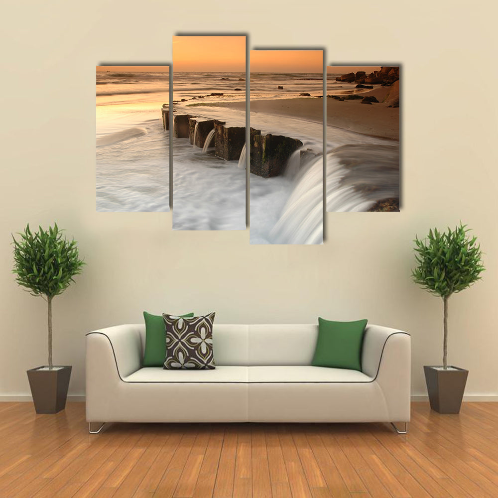 Waterfall By The Sea At Sunset Canvas Wall Art