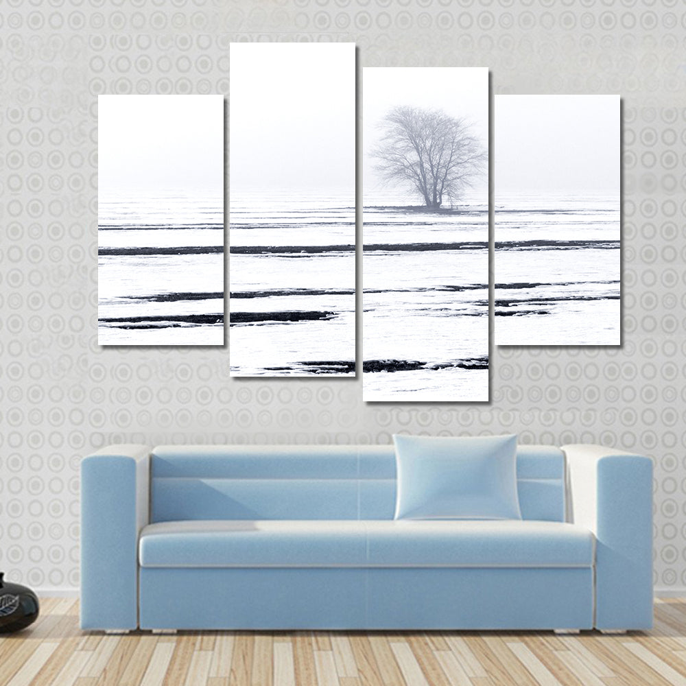 Solitary Tree in Snowy Field Canvas Wall Art