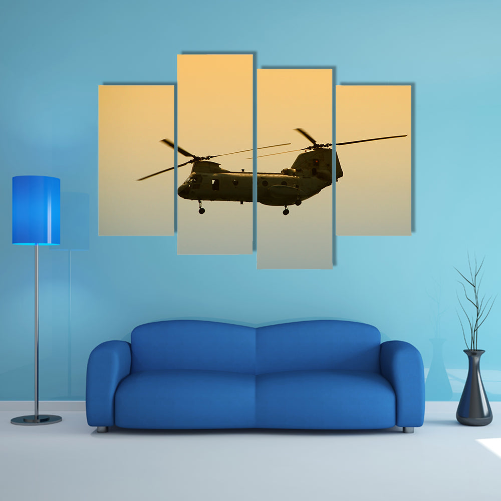 Military Cargo Helicopter In Flight At Dawn Canvas Wall Art